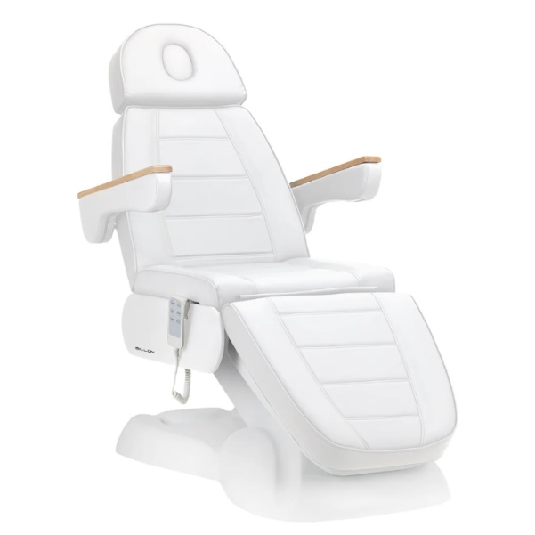Fauteuil blanc réglable pour soins esthétiques.